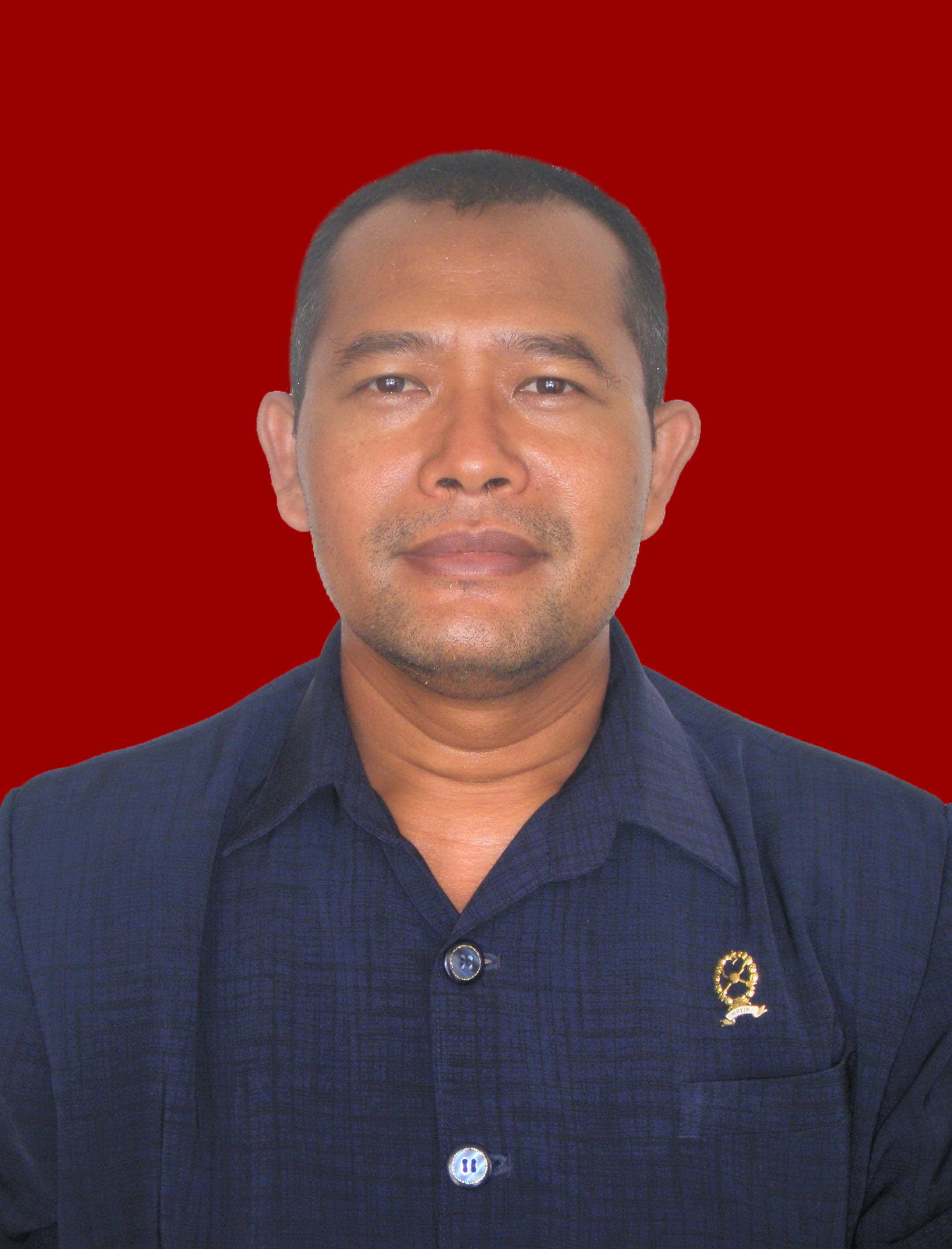 Foto Drs. Masngaril Kirom, S.H., M.HES.